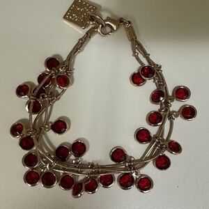 Anne Klein Gold Bracelet with Rich Red Stones